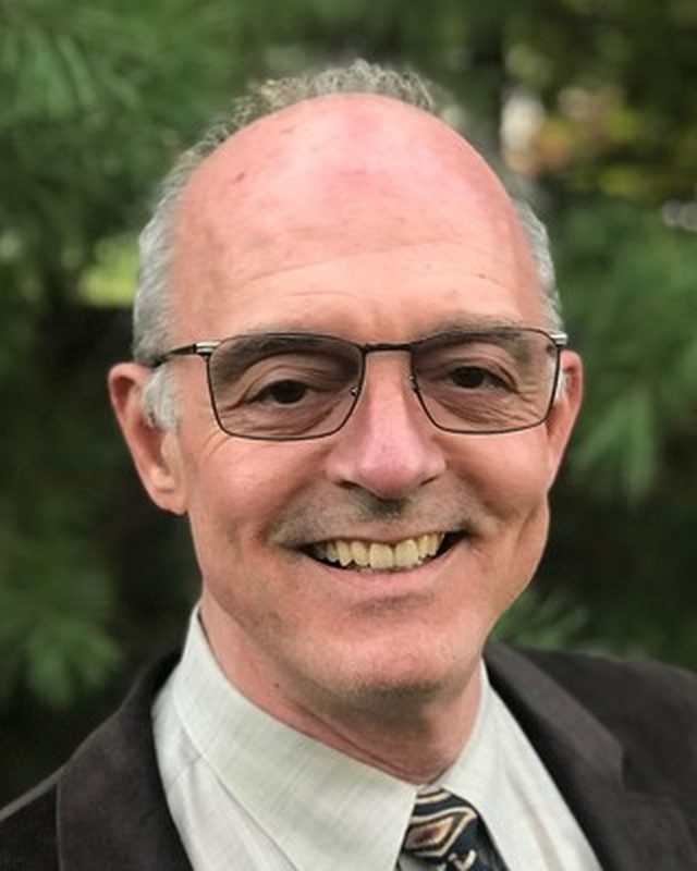 George J. Costanzo, PMHNP-BC, smiling outdoors